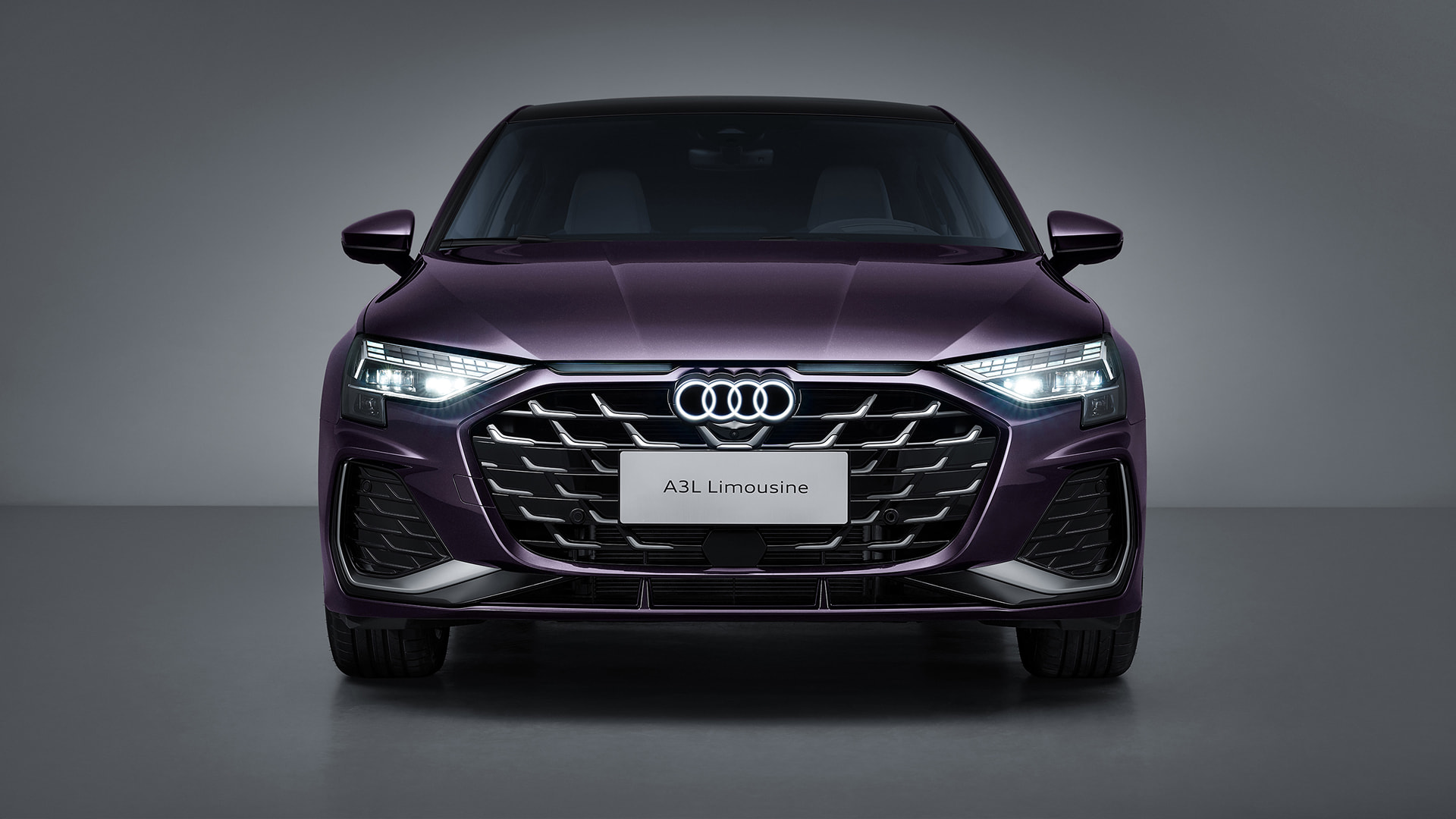 Front view of a purple Audi A3L Limousine; official Audi China image, candidate condition not implied